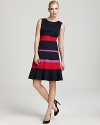 Vibrant stripes brighten up this Anne Klein Dress color-block dress for a head-turning, office-perfect look.