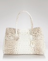 Stamp your daytime look with considered accessories like this croc-embossed leather tote from Furla. In a timeless shape, this bag will be chic this season and next.