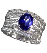 A true blue beauty. EFFY Collection's wide band ring highlights a stunning oval-cut sapphire at center (1-9/10 ct. t.w.) on a backdrop of five round-cut diamond covered bands (1 ct. t.w.). Set in 14k white gold. Approximate width: 7/8 inch.