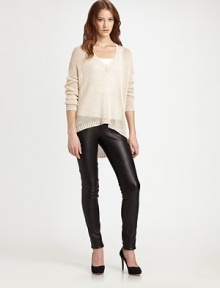 Oversized, semi-sheer knit with a plunging v-neck, framed by dropped shoulders, dolman sleeves and a ribbed, hi-low hem. V-neckDropped shouldersLong dolman sleevesRibbed cuffs and hemHi-low hemLinenDry cleanImported of Italian fabricModel shown is 5'10 (177cm) wearing US size Small. Oversized, semi-sheer knit with a plunging v-neck, framed by dropped shoulders, dolman sleeves and a ribbed, hi-low hem. V-neckDropped shouldersLong dolman sleevesRibbed cuffs and hemHi-low hemLinenDry cleanImported of Italian fabricModel shown is 5'10 (177cm) wearing US size Small.