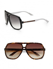 Oversized retro frames with signature stripe detail and G logo. Available in black/white with grey lens or tortoise with brown lens. Brow bar 100% UV protection Made in Italy Oversized retro frames with signature stripe detail and G logo. Available in black/white with grey lens or tortoise with brown lens. Brow bar 100% UV protection Made in Italy