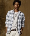 Channel urban-meets-outdoor style in an ultra-comfy plaid flannel shirt for a look that's cool and effortless.