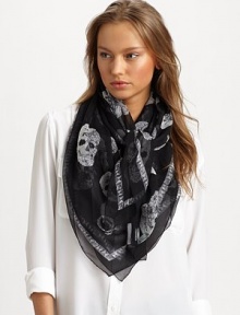 An iconic print with multiple crystallized skulls on luxurious silk. SilkAbout 55 X 55Dry cleanMade in Italy An iconic print with multiple crystallized skulls on luxurious silk. SilkAbout 55 X 55Dry cleanMade in Italy