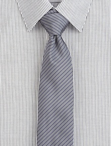 A power style for the power player, crafted in a luxurious silk blend, enhanced with a contrasting thin stripe pattern.About 2½ wide62% silk/38% cottonDry cleanMade in USA of Italian fabric A power style for the power player, crafted in a luxurious silk blend, enhanced with a contrasting thin stripe pattern.About 2½ wide62% silk/38% cottonDry cleanMade in USA of Italian fabric