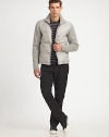 EXCLUSIVELY OURS. A multi-textured version of the wintertime standard, pairing a lightly down-filled body with warm, wool-knit sleeves. A heavy-duty zipper ensures that the chill stays outside. Zip frontSide slash pocketsNylon liningAbout 28 from shoulder to hemBody: polyesterSleeves: woolHand washImported