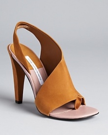 Leave it to DIANE von FURSTENBERG to design a unique open-sided sandal silhouette that we can't wait to get our hands on. Leave it to DIANE von FURSTENBERG to design a unique open-sided sandal silhouette that we can't wait to get our hands on.