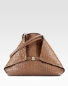 Rich ostrich skin, crafted in a foldover trapezoid silhouette, cinched by a center buckle closure.Shoulder straps, 10½ drop Buckle strap Protective metal feet One inside zip pocket Two inside open pockets Leather lining 20W X 18½H X 5½D Imported