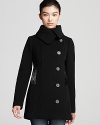 Leather accents bring fashion-forward edge to this plush pea coat from Mackage.