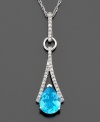 The perfect touch of sparkling elegance. Pendant features pear-cut topaz (2-1/4 ct. t.w.) and round-cut diamond (1/6 ct. t.w.) in 14k white gold setting. Approximate length: 18 inches. Approximate drop: 1-1/4 inches.