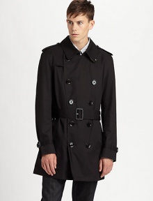 An iconic Burberry Brit style featuring a button front, convenient front pockets and a back vent.Collar neckButton-tab on long sleevesButtoned flap pocketsBack ventFully linedAbout 36 from shoulder to hemPolyesterMachine washImported An iconic Burberry Brit style featuring a button front, convenient front pockets and a back vent.Collar neckButton-tab on long sleevesButtoned flap pocketsBack ventFully linedAbout 36 from shoulder to hemPolyesterMachine washImported