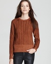 Classically styled in cable-knit wool, this Burberry Brit sweater imbues your everyday look with preppy-chic polish.