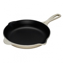 Turn out restaurant-caliber frittatas and gold-star gravies. This skillet has a cast iron exterior for uniform heating, and a black enamel interior that seals in juices. Dual pour spouts accommodate right- or left-handers. Turn out restaurant-caliber frittatas and gold-star gravies. This skillet has a cast iron exterior for uniform heating, and a black enamel interior that seals in juices. Dual pour spouts accommodate right- or left-handers.