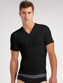 The classic crew is redefined in high-stretch cotton that firms the chest as it flattens the stomach. Crewneck Improves posture Supports lower back No bulk under clothing Tapered shape 81% cotton/19% spandex; machine wash Imported The classic crew is redefined in high-stretch cotton that firms the chest as it flattens the stomach. Crewneck Improves posture Supports lower back No bulk under clothing Tapered shape 81% cotton/19% spandex; machine wash Imported