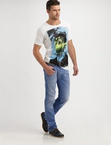 Intensely vibrant graphic accents this cotton essential.V-neckCottonMachine washImported Intensely vibrant graphic accents this cotton essential.V-neckCottonMachine washImported