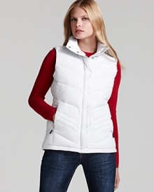 A new look on The North Face® classic down vest... the Carmel has 700 fill goose down insulation for warmth in the coldest conditions. A new look on The North Face® classic down vest... the Carmel has 700 fill goose down insulation for warmth in the coldest conditions.