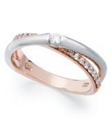 Sparkle and shine combine on this pretty overlap ring. Crafted in sterling silver and 14k rose gold with sparkling round-cut cubic zirconias (1/6 ct. t.w.). Size 7.