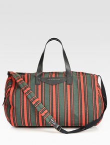 Versatile striped fabric duffle accommodates the essentials, including two tech compartments.Two leather top handlesAdjustable shoulder strap, 21.5-49.5 longTop zip closureTwo outside side zip pocketsInside zip pocketTwo tech compartmentsLined70% cotton/30% polyester20W X 13.5H X 13.5DImported Versatile striped fabric duffle accommodates the essentials, including two tech compartments.Two leather top handlesAdjustable shoulder strap, 21.5-49.5 longTop zip closureTwo outside side zip pocketsInside zip pocketTwo tech compartmentsLined70% cotton/30% polyester20W X 13.5H X 13.5DImported