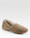 Suede slipper fully lined in genuine sheepskin for a warm, cozy fit.Suede upperSheepskin liningPadded insoleLeather soleMade in EnglandFur origin: Belgium