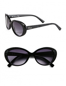 A retro cat's-eye frame is given an ultra-cool update in textured acetate with logo temples. Available in black with violet gradient lens.Logo temples100% UV protectionMade in Italy A retro cat's-eye frame is given an ultra-cool update in textured acetate with logo temples. Available in black with violet gradient lens.Logo temples100% UV protectionMade in Italy