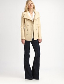 A classic, structural silhouette finished with two rows of pearlized buttons and flattering princess seams.Stand collarLong sleevesTab epaulettes with buttonsDouble-breasted button frontPrincess seamsSide slash pocketsFully lined70% wool/30% nylonDry cleanImportedModel shown is 5'10 (177cm) wearing US size 4. A classic, structural silhouette finished with two rows of pearlized buttons and flattering princess seams.Stand collarLong sleevesTab epaulettes with buttonsDouble-breasted button frontPrincess seamsSide slash pocketsFully lined70% wool/30% nylonDry cleanImportedModel shown is 5'10 (177cm) wearing US size 4.