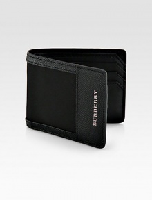 Carry your cards and cash in style with this masculine, yet modern hipfold design rendered in a sturdy nylon with signature leather trim and detail.One billfold compartmentSix card slots94% polyamide/6% acrylic3W x 4HImported Carry your cards and cash in style with this masculine, yet modern hipfold design rendered in a sturdy nylon with signature leather trim and detail.One billfold compartmentSix card slots94% polyamide/6% acrylic3W x 4HImported