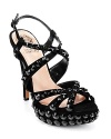 These tall strappy VINCE CAMUTO sandals are ready to come out and play on your next evening out. Basic black sparkles studded with oversized accents.