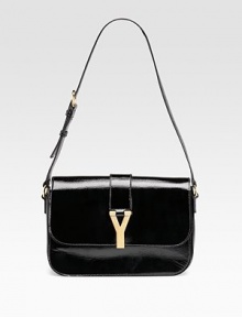 A classic design in gently textured patent leather with goldtone Y closure.Adjustable shoulder strap, 8¾ drop Magnetic snap on flap Open pocket under flap Two inside compartments Suede lining 11W X 7H X 2D Made in Italy