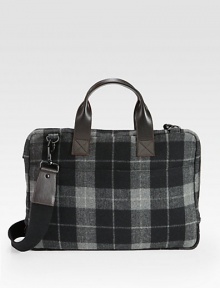 Mixing style with utility, this double-faced wool brief is water resistant and extremely durable.Zip closureDouble top handlesAdjustable, removable shoulder strapInterior zip pocketInterior laptop pocketWool12W x 16H x 2DImported Mixing style with utility, this double-faced wool brief is water resistant and extremely durable.Zip closureDouble top handlesAdjustable, removable shoulder strapInterior zip pocketInterior laptop pocketWool12W x 16H x 2DImported