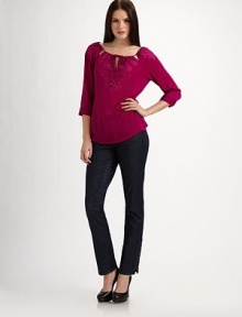 This pretty style features a beautifully embroidered, keyhole yoke and three-quarter length sleeves. Tie scoopneckThree-quarter length sleeves with pleated cuffsEmbroidered yoke with keyhole detailsPull-on styleAbout 23¼ from shoulder to hem92% silk/8% spandexDry cleanImported Model shown is 5'10 (177cm) wearing US size Small. This pretty style features a beautifully embroidered, keyhole yoke and three-quarter length sleeves. Tie scoopneckThree-quarter length sleeves with pleated cuffsEmbroidered yoke with keyhole detailsPull-on styleAbout 23¼ from shoulder to hem92% silk/8% spandexDry cleanImported Model shown is 5'10 (177cm) wearing US size Small.