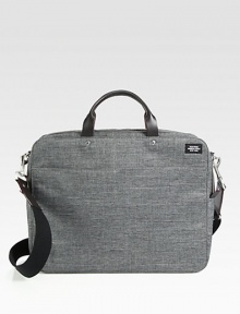 The ultimate travel brief, this bag designed from technical bonded oxford fabric, repels water with ease. It is also TSA approved to pass through airport security without removing a laptop or tablet. Additional functionality includes interior zip pockets and a flap that allows you to fit this style onto the handle of any roller bag.Zip closureDouble top handlesAdjustable shoulder strapTechnical oxford fabric13W x 16H x 4HImported The ultimate travel brief, this bag designed from technical bonded oxford fabric, repels water with ease. It is also TSA approved to pass through airport security without removing a laptop or tablet. Additional functionality includes interior zip pockets and a flap that allows you to fit this style onto the handle of any roller bag.Zip closureDouble top handlesAdjustable shoulder strapTechnical oxford fabric13W x 16H x 4HImported