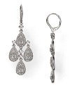 Elegant by night, contemporary by day, this pair of Nadri teardrop chandelier earrings says sparkle, crafted of rhodium plate with a cascade of crystal accents.