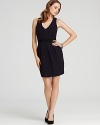 A dainty bow at the waist adds understated femininity to this sleek Shoshanna V-neck dress.