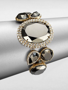 From the Starlight Collection. Rich, dark faceted stone in various sizes surrounded by brilliant, contrasting pavé stones in a stunning link design. GlassGoldtoneLength, about 8Toggle closureImported From the Starlight Collection. Rich, dark faceted stone in various sizes surrounded by brilliant, contrasting pavé stones in a stunning link design. GlassGoldtoneLength, about 8Toggle closureImported