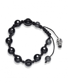 Spiritual-inspired bracelets are all the rage this season! Snap up this hot style from Ali Khan featuring semi-precious black agate beads and a silver tone skull accent on a trendy black cord. Bracelet adjusts to fit the wrist. Approximate diameter: 2 inches. Approximate length: 12-1/4 inches. Spiritual-inspired bracelets are all the rage this season! Snap up this hot style from Ali Khan featuring semi-precious black agate beads and a silver tone skull accent on a trendy black cord. Bracelet adjusts to fit the wrist. Approximate diameter: 2 inches. Approximate length: 12-1/4 inches.