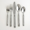 This set includes four each of: dinner fork, dinner spoon, salad fork, teaspoon and dinner knife.