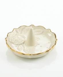 A single rose blossom and delicate dots carved in ivory porcelain make this classic ring holder a fine storage space for special jewelry. With a scalloped, gold-tipped rim. Qualifies for Rebate A single rose blossom and delicate dots carved in ivory porcelain make this classic ring holder a fine storage space for special jewelry. With a scalloped, gold-tipped rim. Qualifies for Rebate