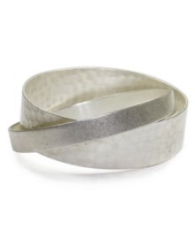 Lock in fabulous style with Jones New York's interlocked bangle. Bracelet crafted from two bands of silvertone mixed metal. Approximate diameter: 2-3/4 inches. Lock in fabulous style with Jones New York's interlocked bangle. Bracelet crafted from two bands of silvertone mixed metal. Approximate diameter: 2-3/4 inches.