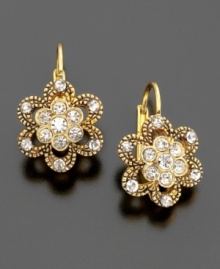 Timeless but trendy: these fabulous goldtone flower earrings from Betsey Johnson feature pretty crystal accents for a touch of twinkle. Timeless but trendy: these fabulous goldtone flower earrings from Betsey Johnson feature pretty crystal accents for a touch of twinkle.