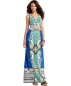 Channel the exotic appeal of a land far away with NY Collection's printed maxi dress!