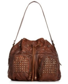 Get your groove on with this hippie-chic inspired design from Frye. Buttery vintage leather is outfitted with hand hammered studs that add dimension and detail, while the super spacious interior stashes your day-to-day essentials without a worry. Get your groove on with this hippie-chic inspired design from Frye. Buttery vintage leather is outfitted with hand hammered studs that add dimension and detail, while the super spacious interior stashes your day-to-day essentials without a worry.