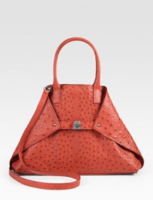 Ostrich foldover trapezoid silhouette cinched by a center turn-lock buckle closure.Double top handles, 5 dropDetachable shoulder strap, 23 dropTop snap closure and versatile turn-lock buckle closure, can be tucked into bag for a tote silhouetteProtective metal feetOne inside zip pocketTwo inside open pocketsLeather lining15¾W X 9H X 4DImported Ostrich foldover trapezoid silhouette cinched by a center turn-lock buckle closure.Double top handles, 5 dropDetachable shoulder strap, 23 dropTop snap closure and versatile turn-lock buckle closure, can be tucked into bag for a tote silhouetteProtective metal feetOne inside zip pocketTwo inside open pocketsLeather lining15¾W X 9H X 4DImported