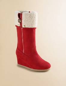 Velvety faux suede on a covered wedge heel, topped by a cuddly faux shearling cuff.> Faux suede upperOutside zipper with stud accentsCovered wedgeFaux shearling liningPadded insoleRubber composite soleImported Velvety faux suede on a covered wedge heel, topped by a cuddly faux shearling cuff.> Faux suede upperOutside zipper with stud accentsCovered wedgeFaux shearling liningPadded insoleRubber composite soleImported