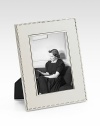 A stunning display for a treasured photograph, designed in heirloom-quality sterling silver with tiny-bead trim. Accommodates a 5 X 7 photograph Overall, 7 X 9 Sterling silver Made in USA 