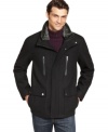 Faux fur at the collar infuses this classic wool-blend jacket from Michael Kors with modern luxury.