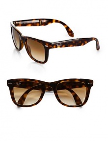 Limited Edition Folding Wayfarer Sunglasses. A classic style reinvented to fold into a small case for travel convenience. Available in black with smoke lens or tortoise with brown lens. Exclusive hard case with magnetic closure Case dimensions: 2½W X 3½H 1¼D Made in Italy Limited Edition Folding Wayfarer Sunglasses. A classic style reinvented to fold into a small case for travel convenience. Available in black with smoke lens or tortoise with brown lens. Exclusive hard case with magnetic closure Case dimensions: 2½W X 3½H 1¼D Made in Italy