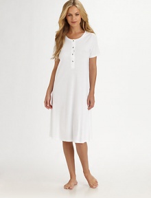 Luxurious versatility in a classic silhouette created from long-staple Egyptian Giza cotton, mercerized for ultra softness and a natural sheen.ScoopneckPartial button-front placketShort sleevesUnderstated, shaped styleMercerized Egyptian Giza cotton interlockMachine washImportedAdditional Information Women's Modern Size Guide Luxurious versatility in a classic silhouette created from long-staple Egyptian Giza cotton, mercerized for ultra softness and a natural sheen.ScoopneckPartial button-front placketShort sleevesUnderstated, shaped styleMercerized Egyptian Giza cotton interlockMachine washImportedAdditional Information Women's Modern Size Guide