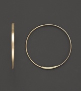 A graceful hoop with invisible closure to create a perfectly elegant orb to complement your most refined ensembles. Designed by Lana.