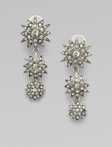 A cascade of shimmering stars, set with dazzling Swarovski crystals in a silvery setting.CrystalSilverplatedLength, about 2Clip-on backMade in Italy A cascade of shimmering stars, set with dazzling Swarovski crystals in a silvery setting.CrystalSilverplatedLength, about 2Clip-on backMade in Italy