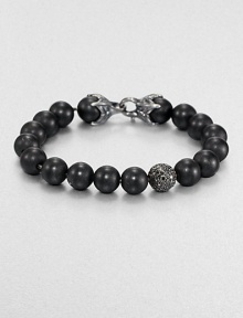 From the Spirited Bead Collection, this two-row beaded bracelet is handsomely crafted from 10mm black onyx beads, featuring a pave black diamond station and a sterling silver lobster clasp.Sterling silverBlack onyx/diamondAbout 9 longAbout 3 diam.Lobster claspImported From the Spirited Bead Collection, this two-row beaded bracelet is handsomely crafted from 10mm black onyx beads, featuring a pave black diamond station and a sterling silver lobster clasp.Sterling silverBlack onyx/diamondAbout 9 longAbout 3 diam.Lobster claspImported