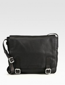 Simple and functional, this classic messenger is tailor-made to hit campus, work and everywhere in between with incredible style.Flap, buckle closureAdjustable shoulder strapExterior, interior pocketsFully linedLeather16W X 14½H X 12DImported Simple and functional, this classic messenger is tailor-made to hit campus, work and everywhere in between with incredible style.Flap, buckle closureAdjustable shoulder strapExterior, interior pocketsFully linedLeather16W X 14½H X 12DImported
